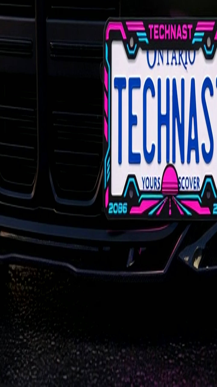 Vertical close-up video showing the Neon Horizon license plate frame installed on a car at night.